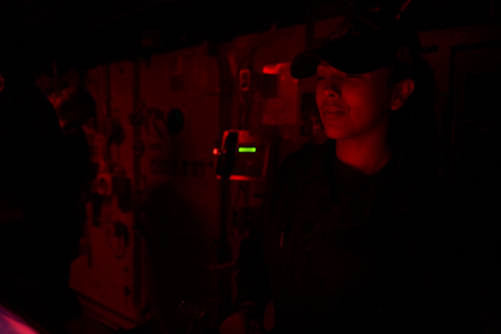 USS San Diego (LPD 22) Sailor Stands Watch on the Helm