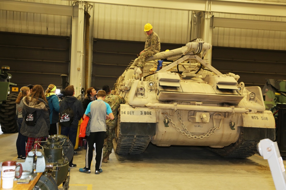 Sparta Innovations STEM Academy students visit with RTS-Maintenance staff at Fort McCoy
