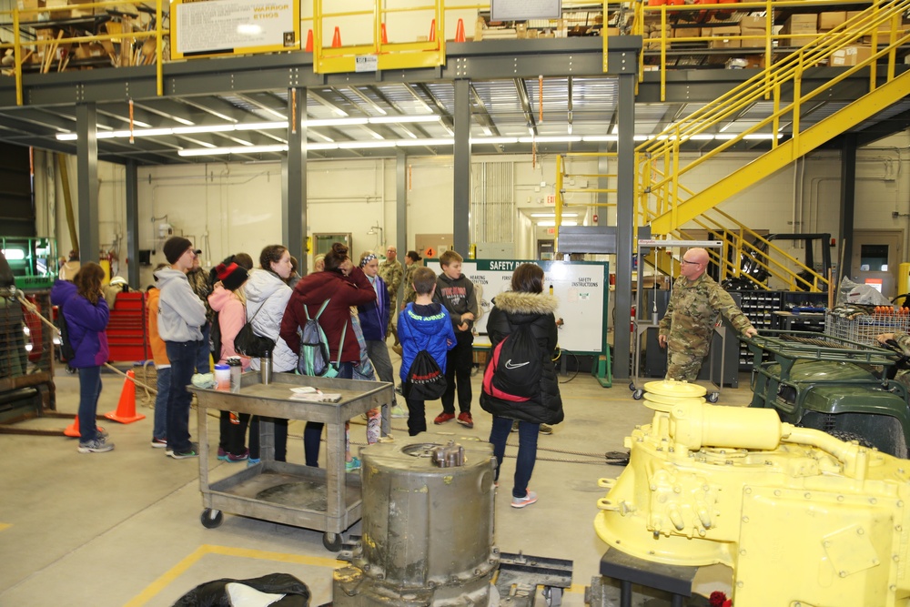Sparta Innovations STEM Academy students visit with RTS-Maintenance staff at Fort McCoy