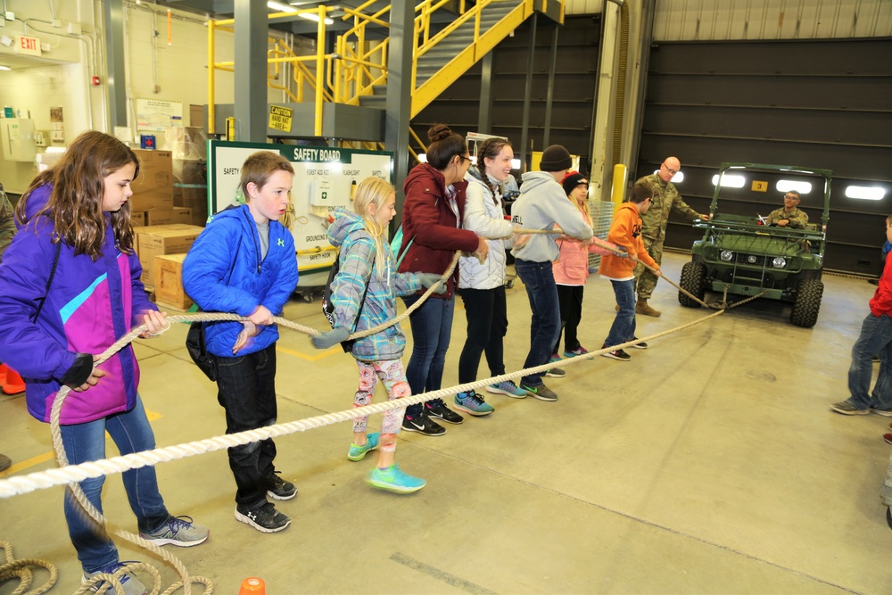 Sparta Innovations STEM Academy students visit with RTS-Maintenance staff at Fort McCoy