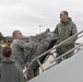 260th ATCS Airmen load gear before deployment to Puerto Rico