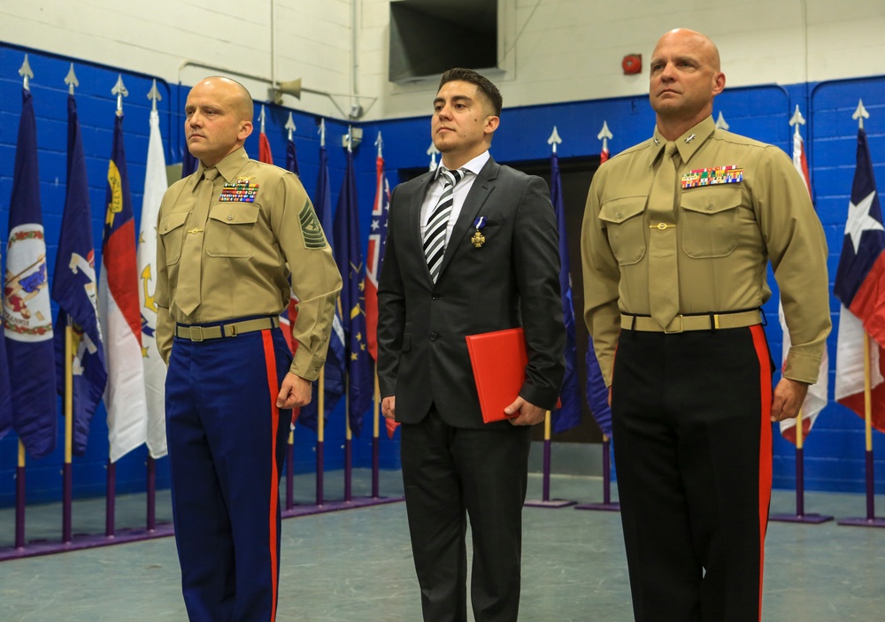 Marine Corps veteran Lance Cpl. Gonzalez receives award upgrade to Navy Cross.