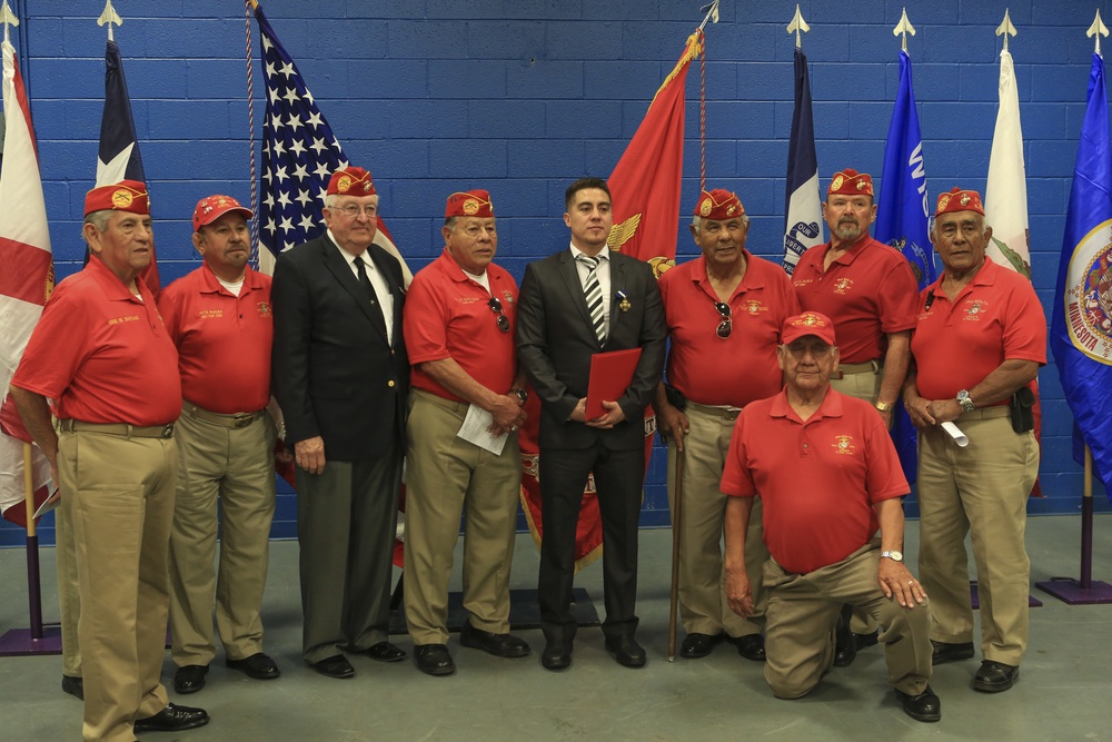 Marine Corps veteran Lance Cpl. Gonzalez receives award upgrade to Navy Cross.