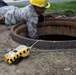 211th Engineering Installation Squadron Airmen install fiber optic cables