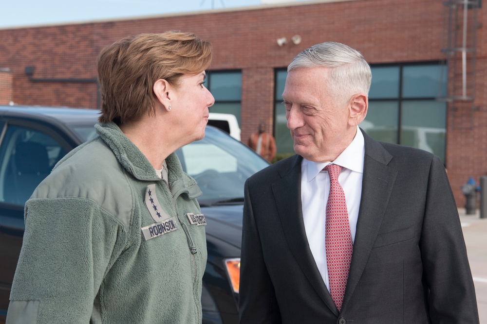 Secretary of Defense vistis Peterson