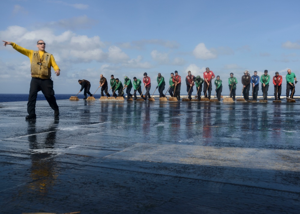 Nimitz Sailors Wash Down Flight Deck