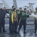 Nimitz Sailors Wash Down Flight Deck