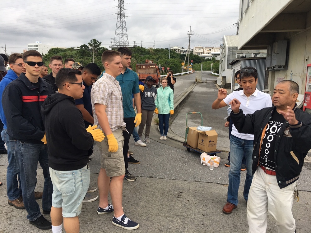 31st MEU Marines and Sailors clean up Kin Town fishing port