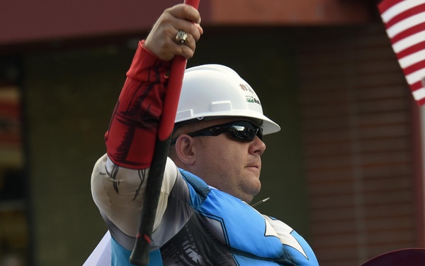 Flags flow, Opinicus stands tall during parade