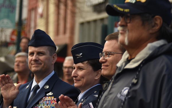 Flags flow, Opinicus stands tall during parade