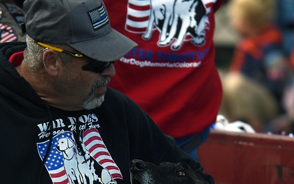 Flags flow, Opinicus stands tall during parade