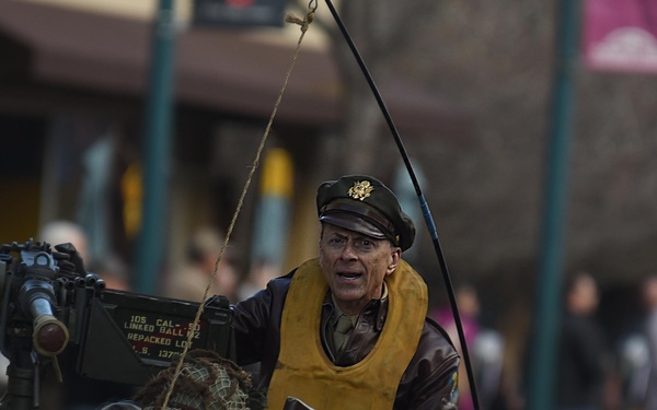 Flags flow, Opinicus stands tall during parade