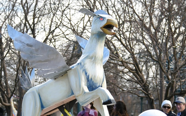 Flags flow, Opinicus stands tall during parade