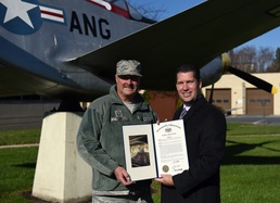 State Rep. Mehaffie presents citation to Airman, tours base