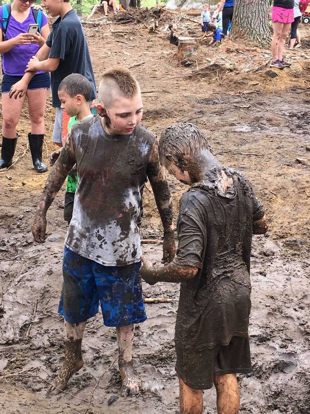 Gleefully West Hill Dam gets down and dirty celebrating 'International Mud Day'