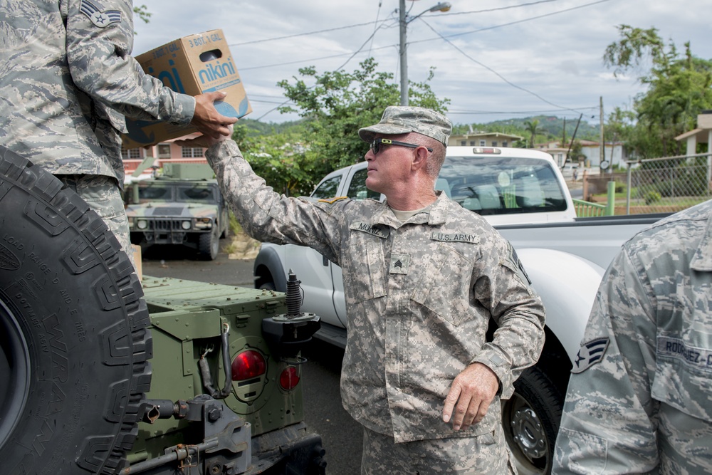 Foundation for Puerto Rico partners with military members to distribute food and water