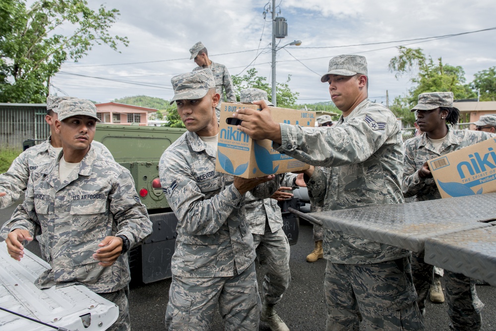 Foundation for Puerto Rico partners with military members to distribute food and water