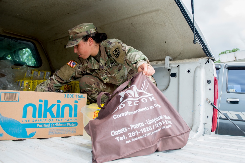 Foundation for Puerto Rico partners with military members to distribute food and water