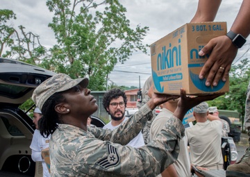 Foundation for Puerto Rico partners with military members to distribute food and water