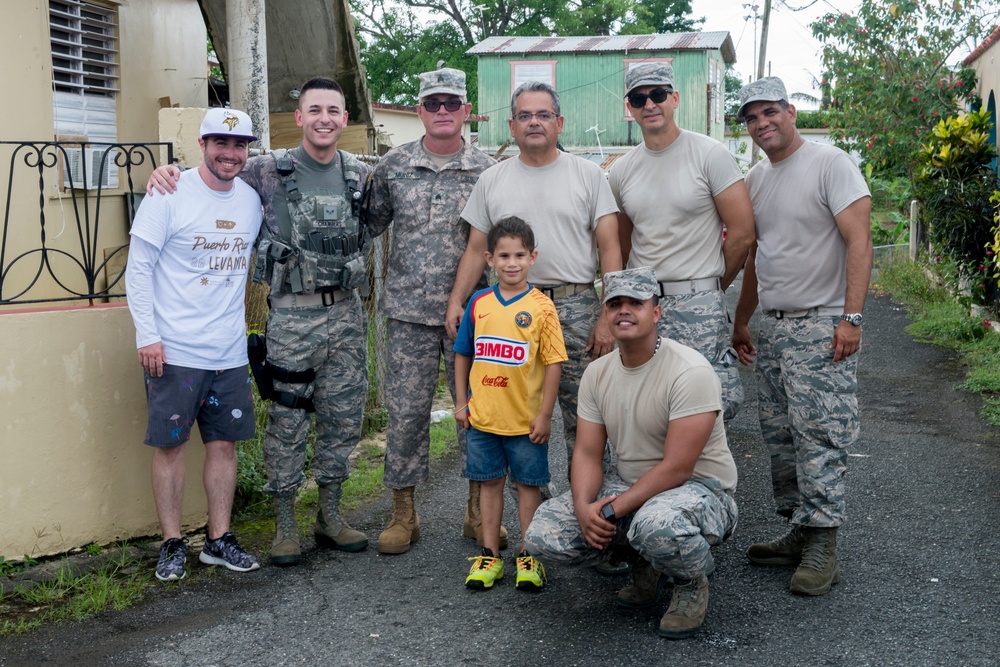 Foundation for Puerto Rico partners with military members to distribute food and water