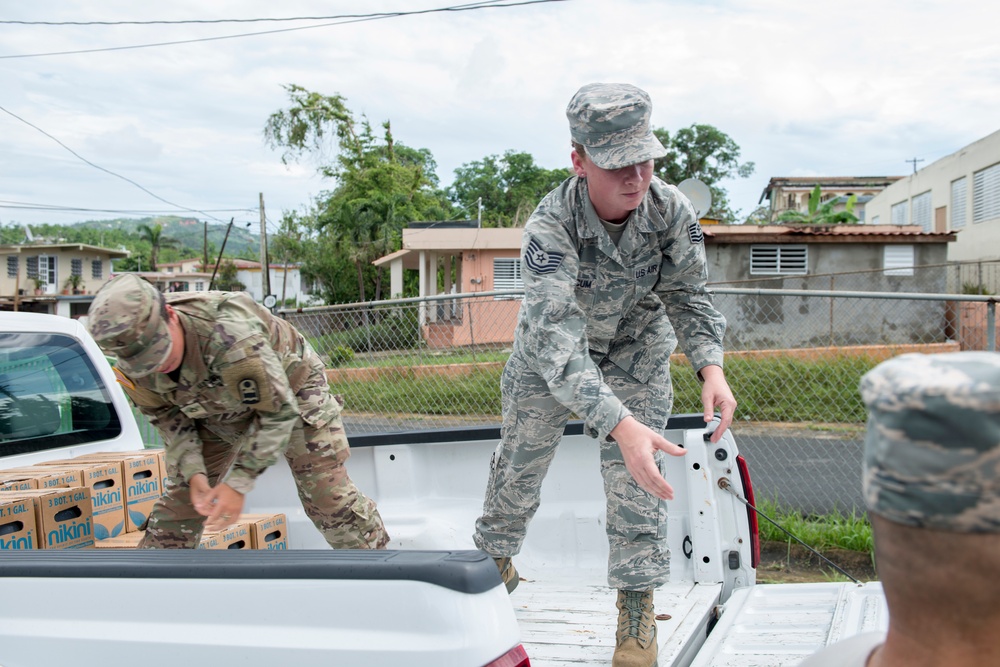 Foundation for Puerto Rico partners with military members to distribute food and water