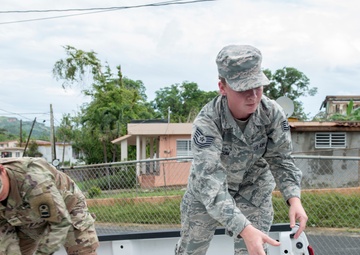 Foundation for Puerto Rico partners with military members to distribute food and water