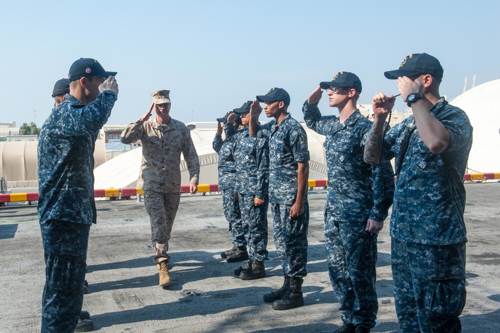 Commander, Marine Forces Central Command arrives on board America