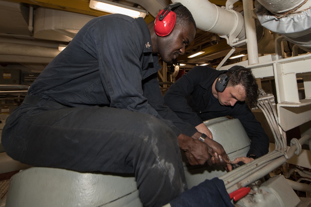 USS Pearl Harbor enginemen conduct routine maintenance