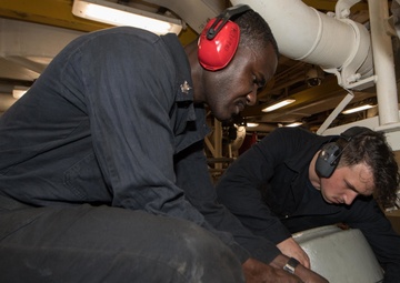 USS Pearl Harbor enginemen conduct routine maintenance