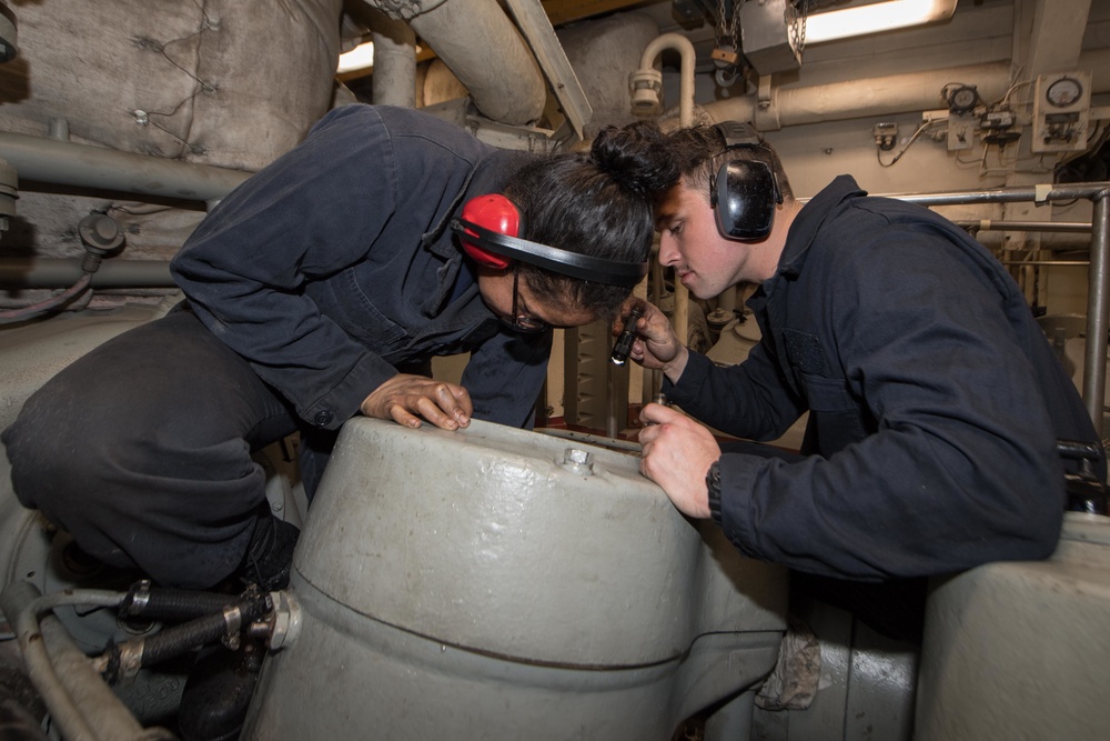 USS Pearl Harbor enginemen conduct routine maintenance