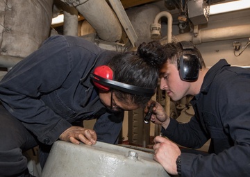 USS Pearl Harbor enginemen conduct routine maintenance