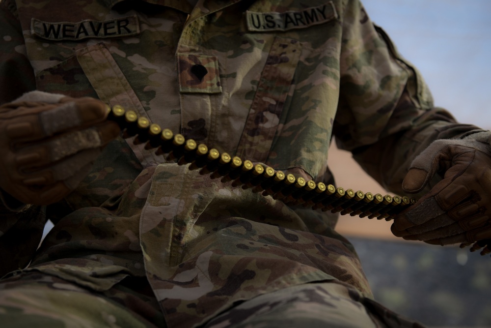 Soldiers conduct live fire shoot house training
