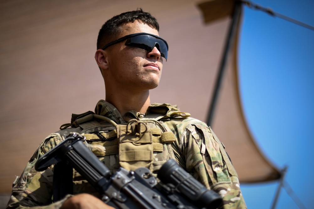 Soldiers conduct live fire shoot house training