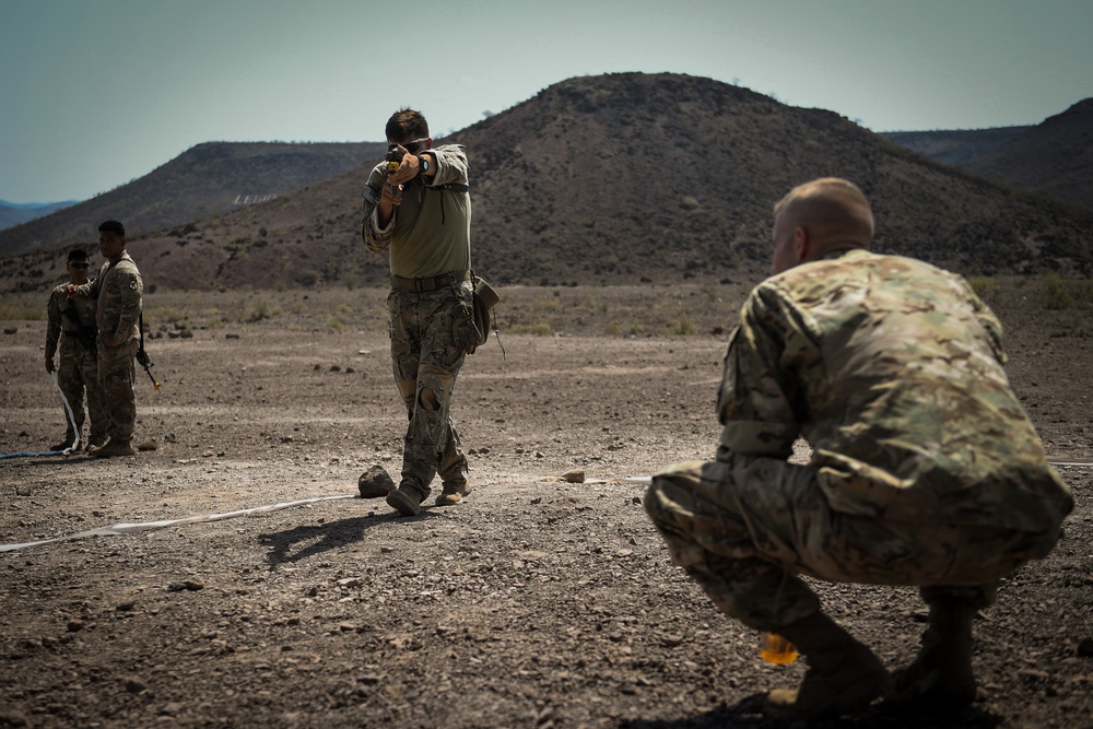Soldiers conduct live fire shoot house training