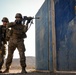 Soldiers conduct live fire shoot house training