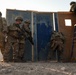Soldiers conduct live fire shoot house training