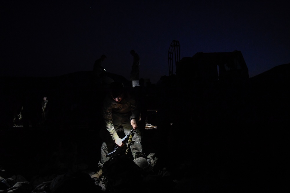 Soldiers conduct live fire shoot house training