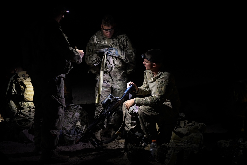 Soldiers conduct live fire shoot house training