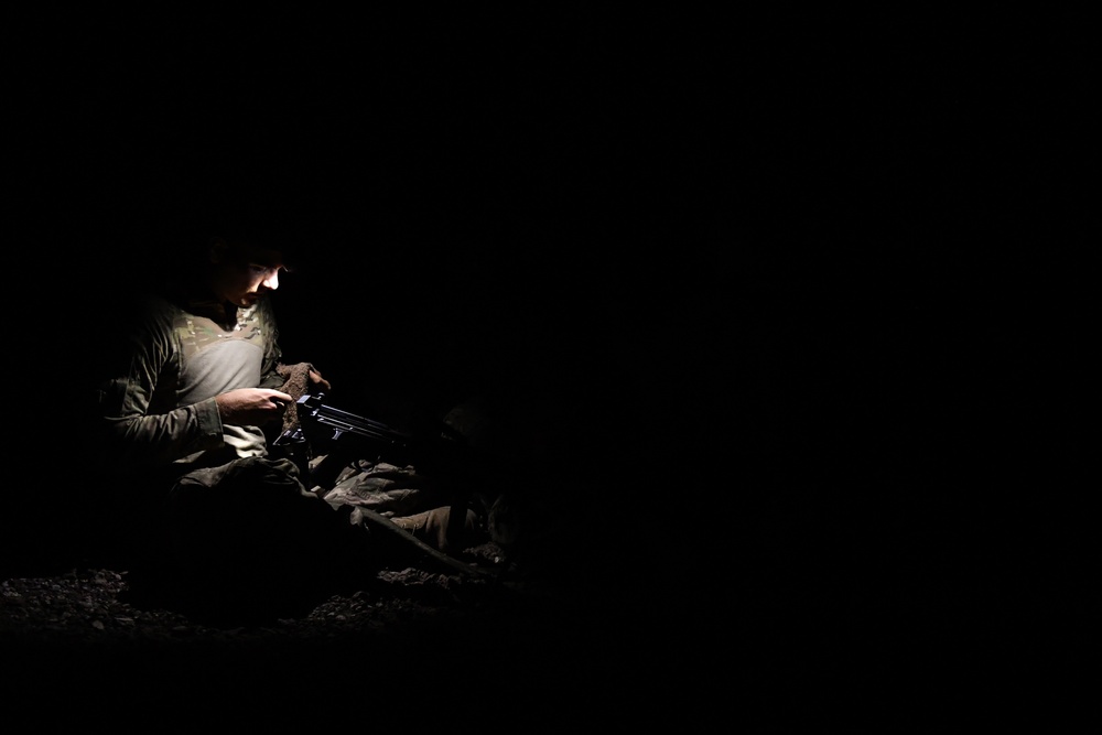 Soldiers conduct live fire shoot house training