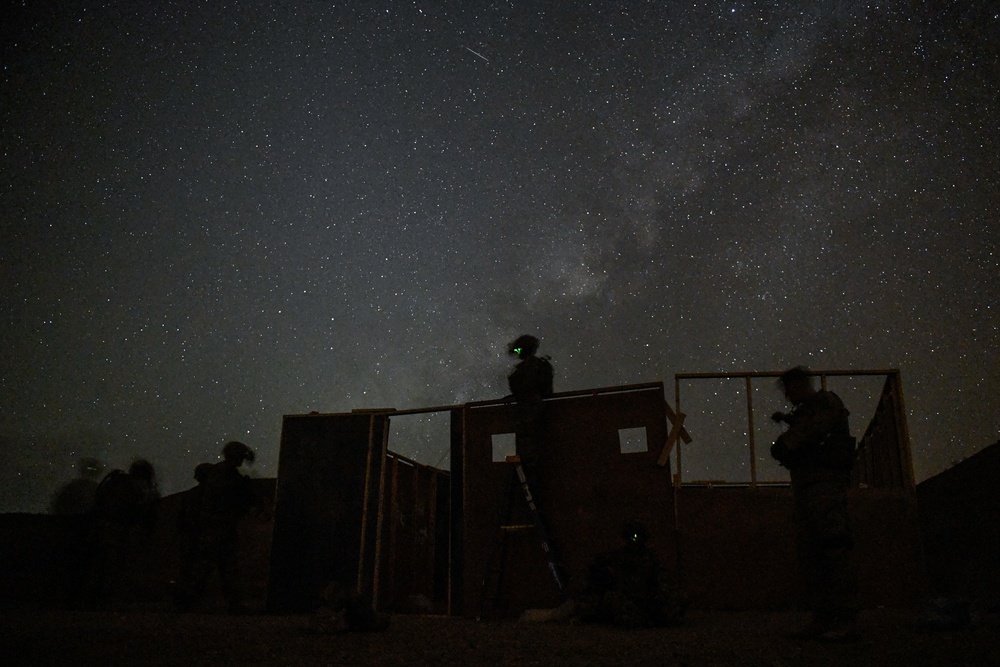 Soldiers conduct live fire shoot house training