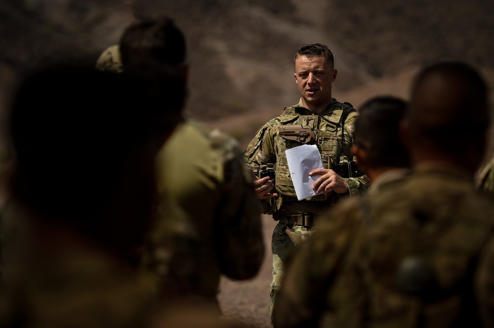Soldiers conduct live fire shoot house training