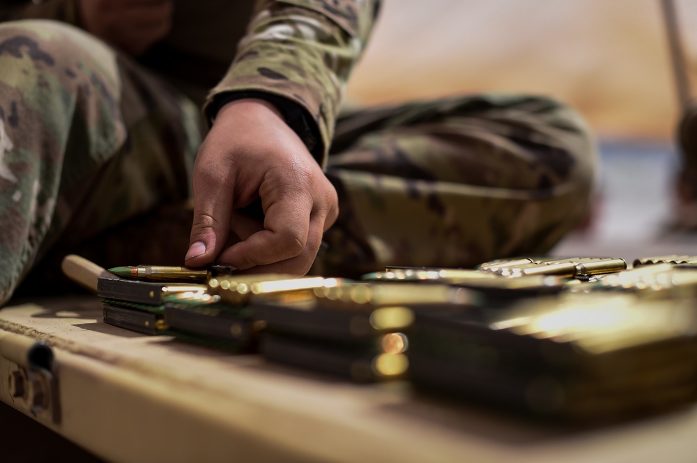 Soldiers conduct live fire shoot house training