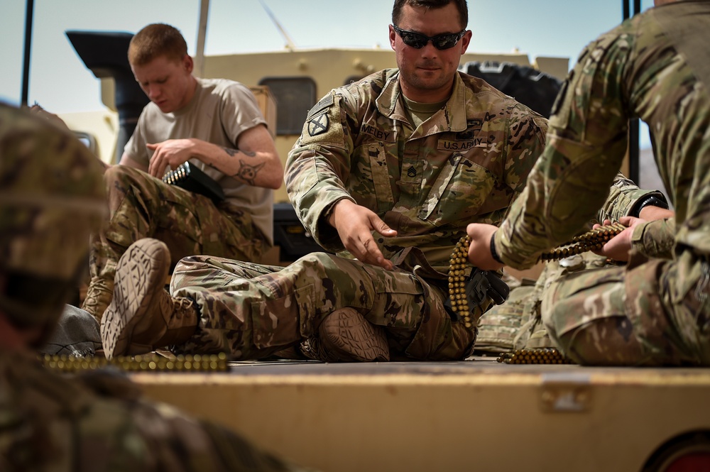Soldiers conduct live fire shoot house training