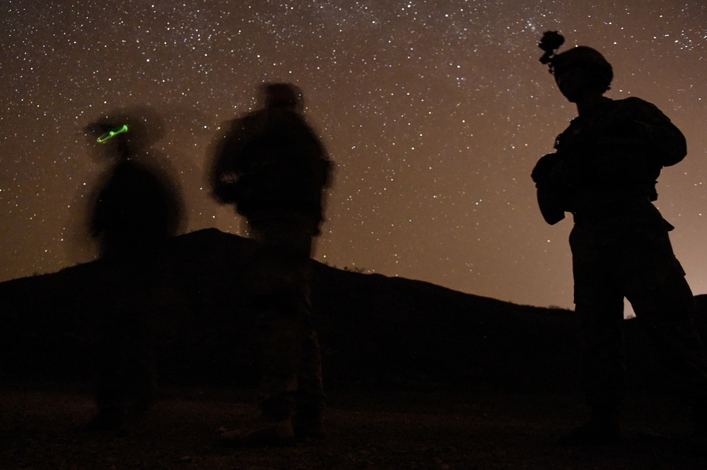 Soldiers conduct live fire shoot house training