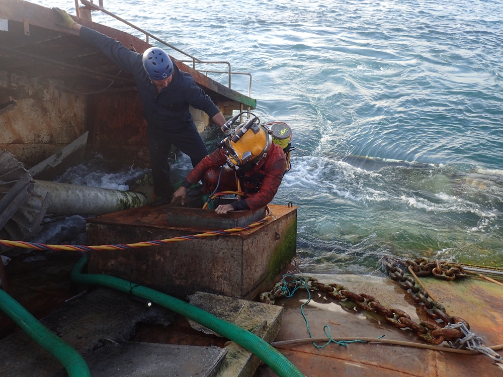 Salvage team dives into the hull of the Pacific Paradise