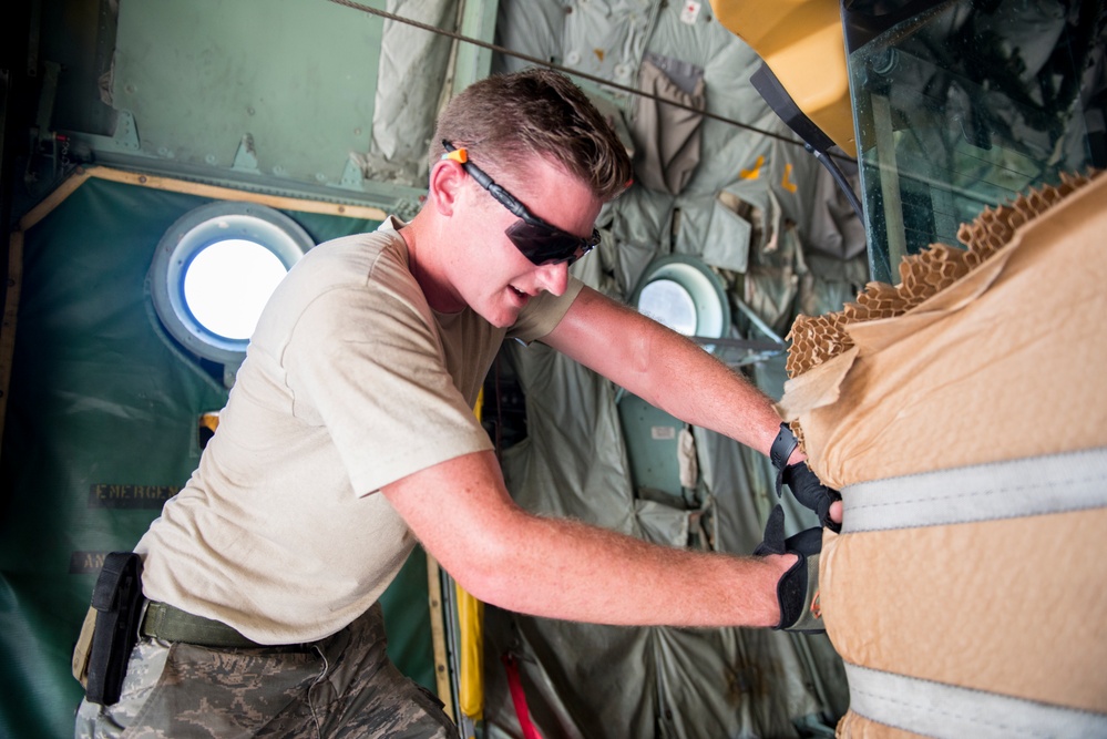 PRANG WC-130H picks up equipment