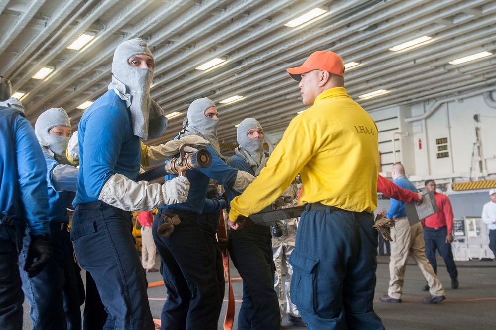 USS America Sailors participate in damage control drills