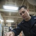 USS America Sailor process supplies