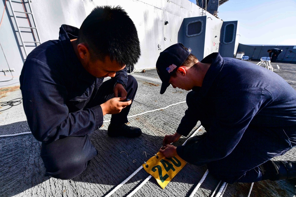 USS San Diego (LPD 22) Sailors Set Up Phone and Distance Line