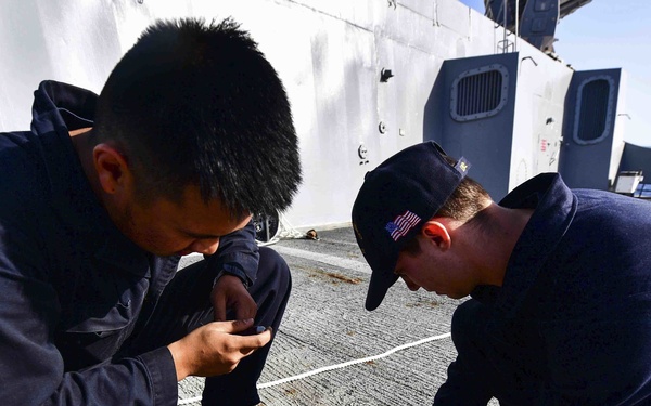 USS San Diego (LPD 22) Sailors Set Up Phone and Distance Line